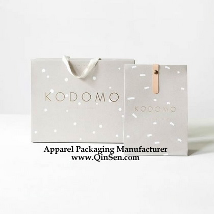 Modern packaging bag design for a stylish brand with Golden text and minimalist logo, geometric dots